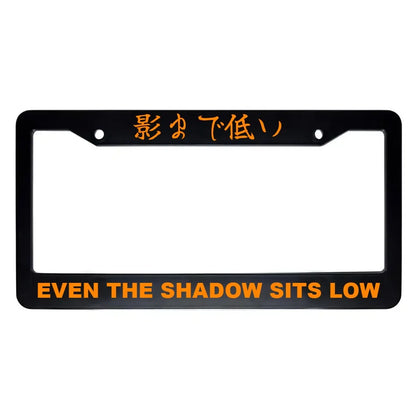 Even the Shadow Sits Low ABS Black Plastic Kanji Japanese License Plate Frame - Orange Text