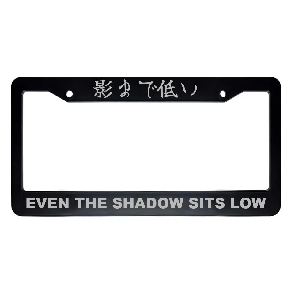 Even the Shadow Sits Low ABS Black Plastic Kanji Japanese License Plate Frame - Silver Text