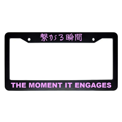 The Moment It Engages ABS Black Plastic Kanji Japanese License Plate Frame - Pink Text