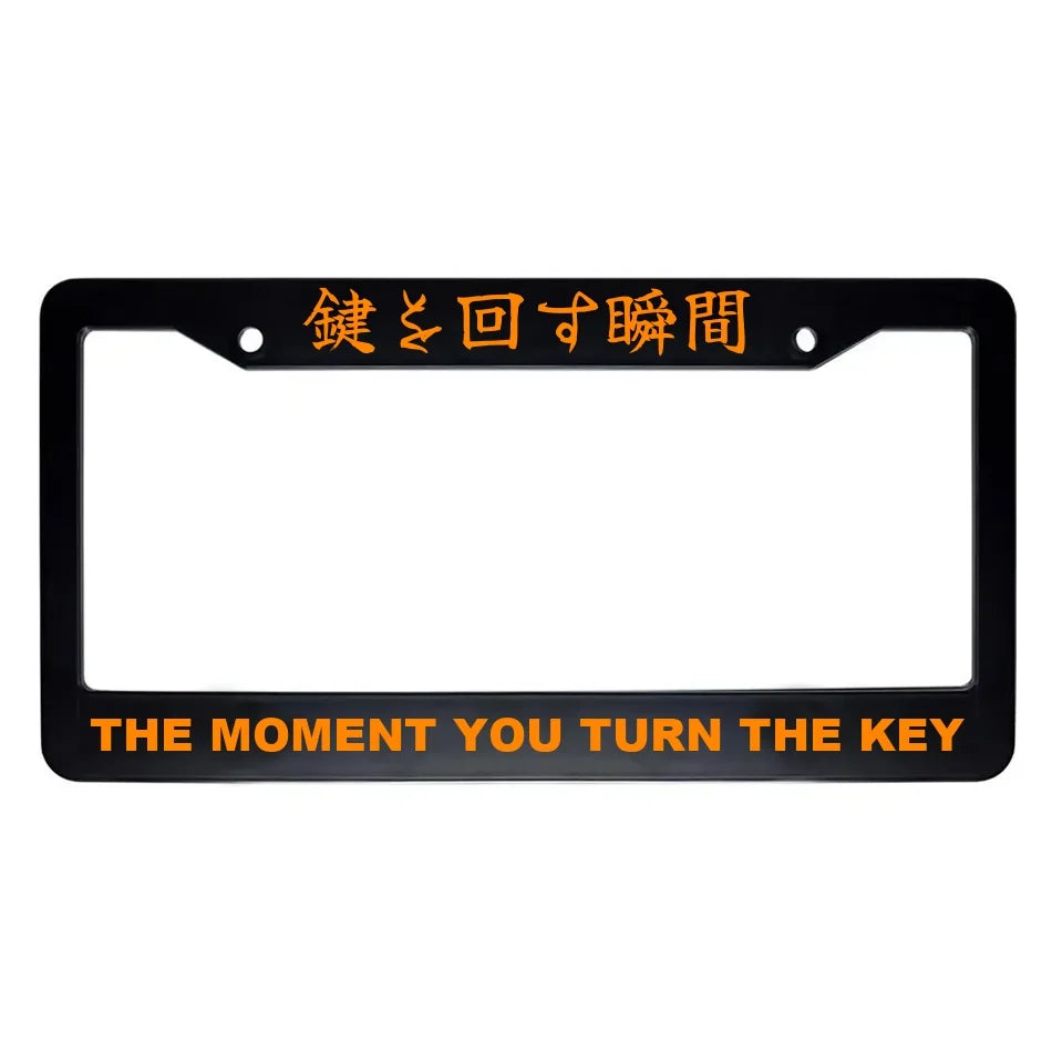 The Moment You Turn the Key ABS Black Plastic Kanji Japanese License Plate Frame - Orange Text
