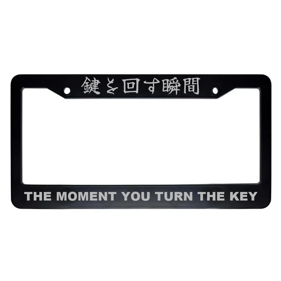 The Moment You Turn the Key ABS Black Plastic Kanji Japanese License Plate Frame - Silver Text