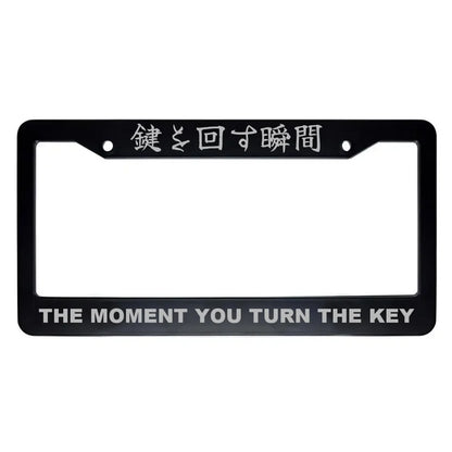 The Moment You Turn the Key ABS Black Plastic Kanji Japanese License Plate Frame - Silver Text
