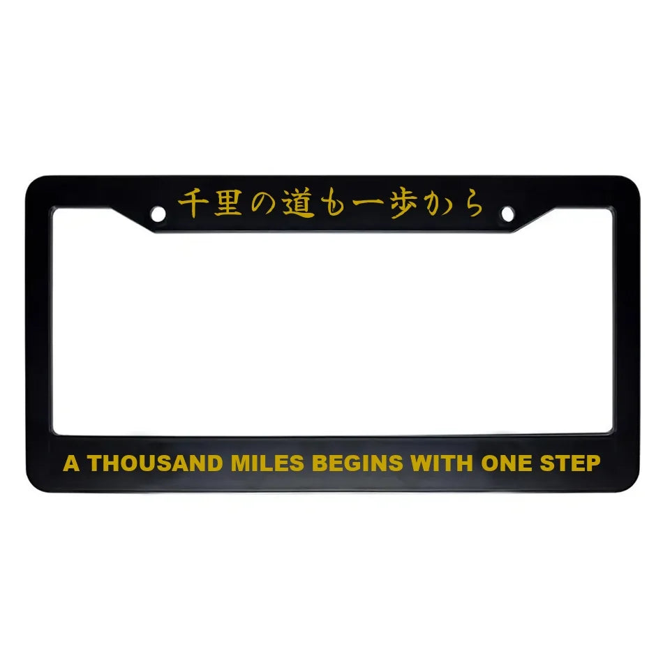 A Thousand Miles Begins With One Step ABS Black Plastic Kanji Japanese License Plate Frame - Gold Text