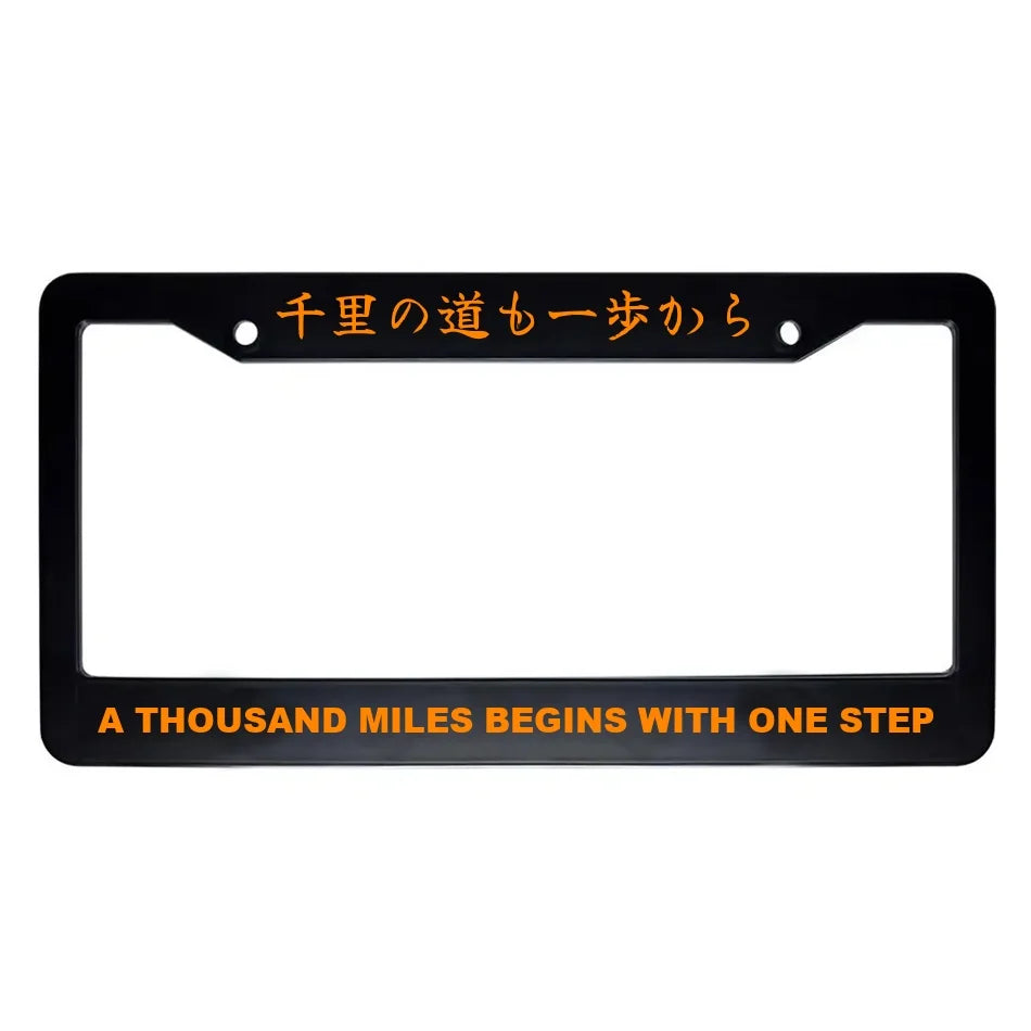 A Thousand Miles Begins With One Step ABS Black Plastic Kanji Japanese License Plate Frame - Orange Text