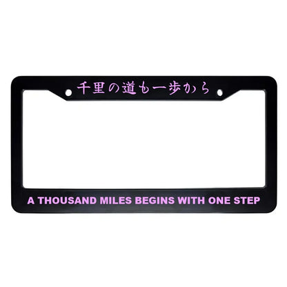 A Thousand Miles Begins With One Step ABS Black Plastic Kanji Japanese License Plate Frame - Pink Text