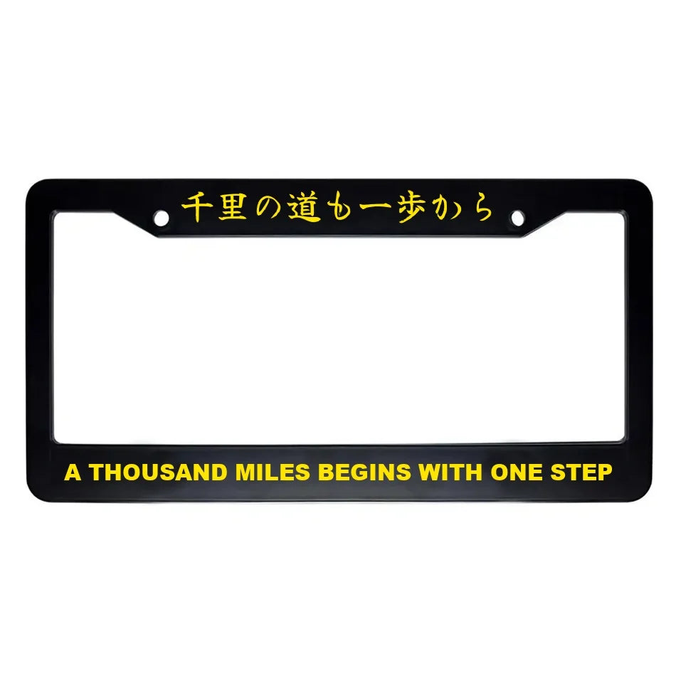 A Thousand Miles Begins With One Step ABS Black Plastic Kanji Japanese License Plate Frame - Yellow Text