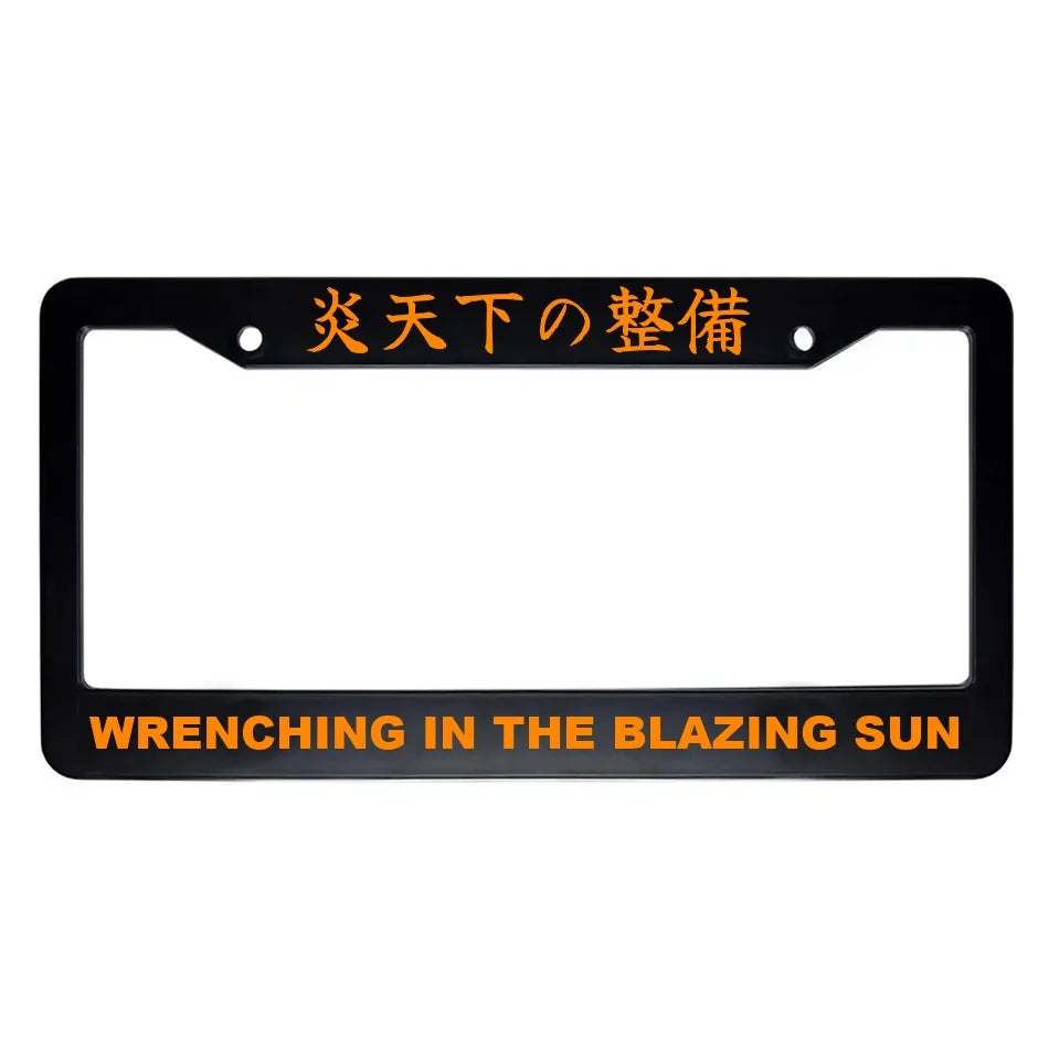 Wrenching in the Blazing Sun ABS Black Plastic Kanji Japanese License Plate Frame - Orange Text