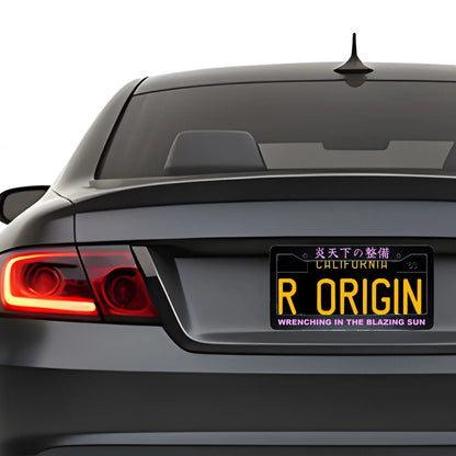 Wrenching in the Blazing Sun ABS Black Plastic Kanji Japanese License Plate Frame installed on car - Pink Text